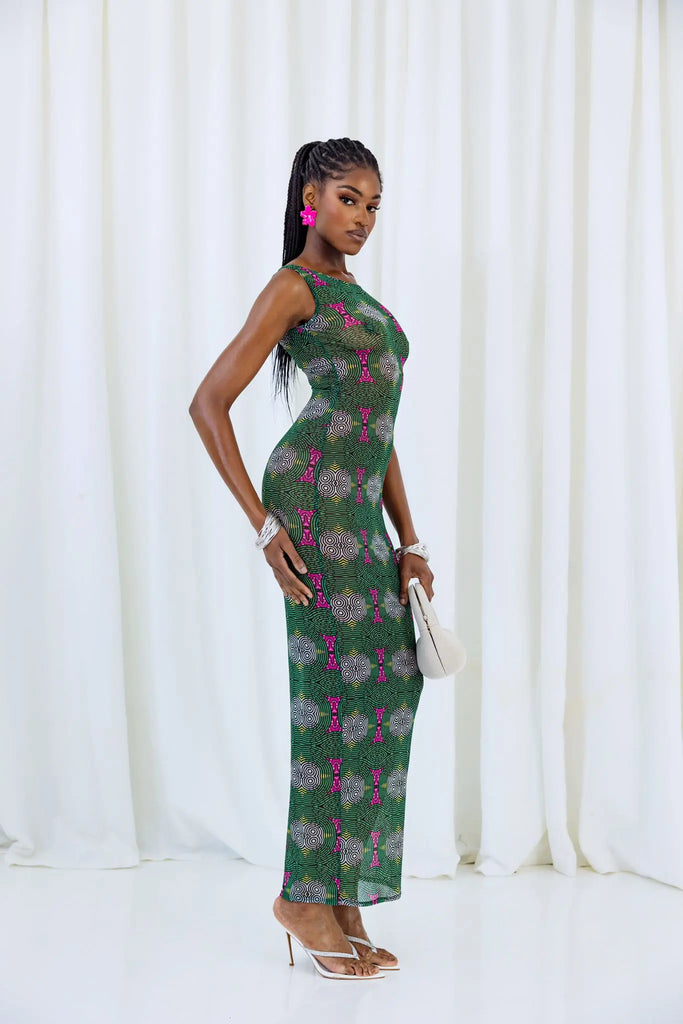 Vibrant African print dress for stylish women featuring a colorful geometric pattern and sleeveless design, displayed against a white background.
