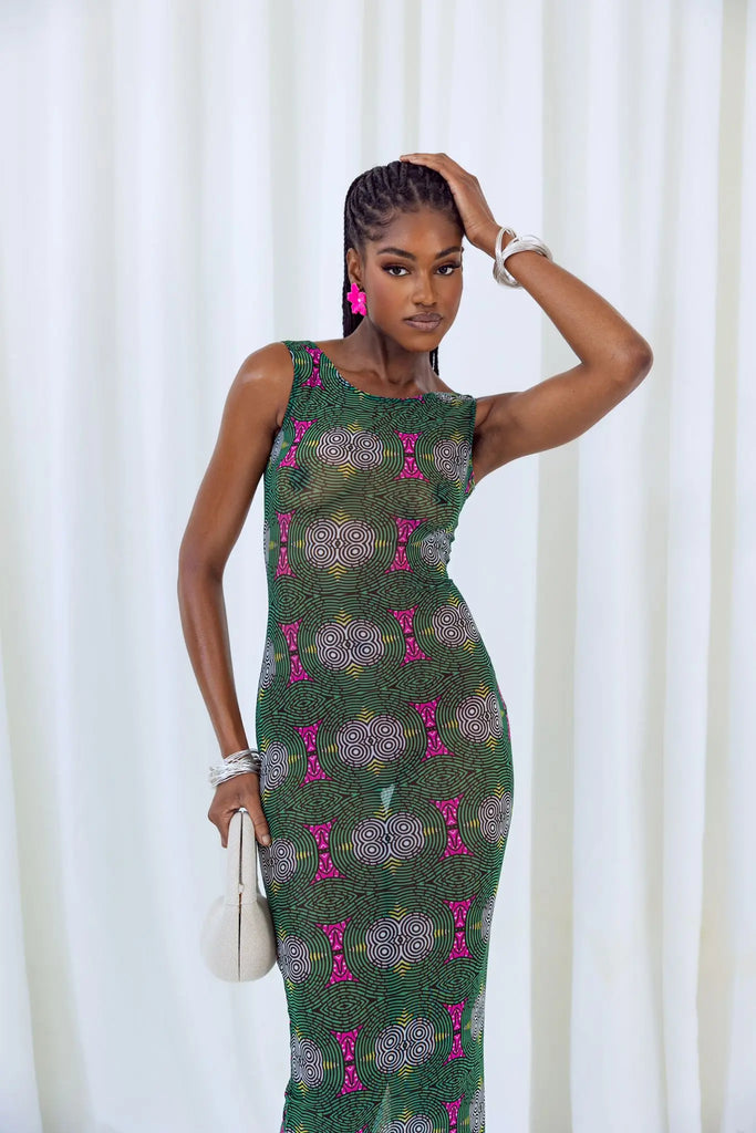 Stylish African print sleeveless dress with vibrant floral patterns, showcasing trendy fashion for women