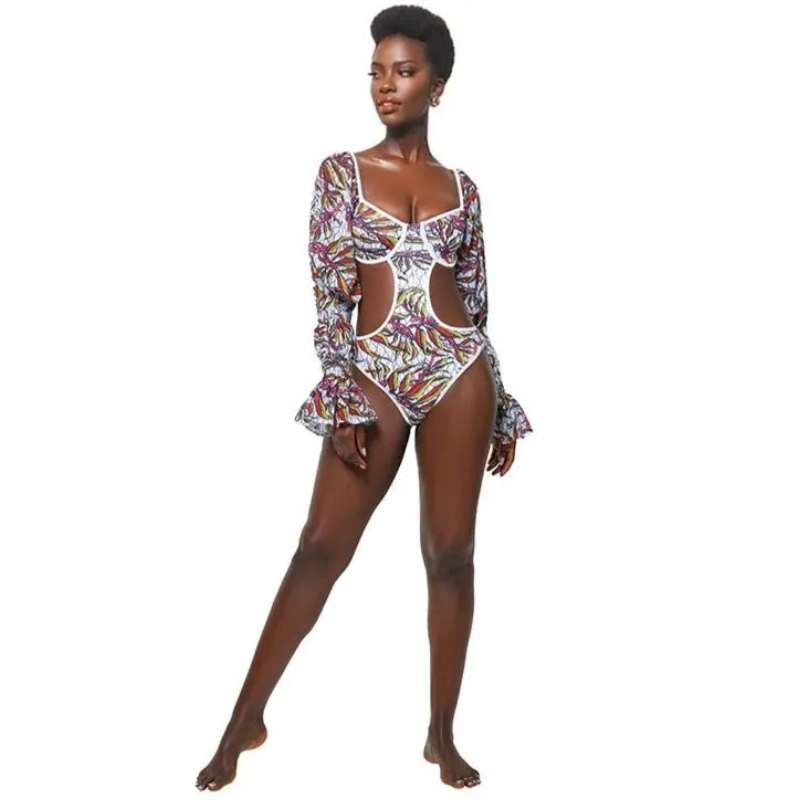 Stylish African print swimsuit with floral patterns, featuring a cut-out design and flared sleeves, showcasing a trendy and fashion-forward beachwear look.