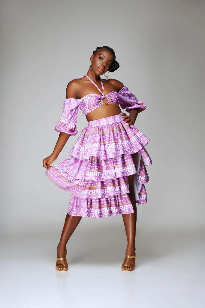 Vibrant African-inspired skirt and crop top set with intricate patterns and ruffled detailing, creating a stylish and culturally-inspired look.